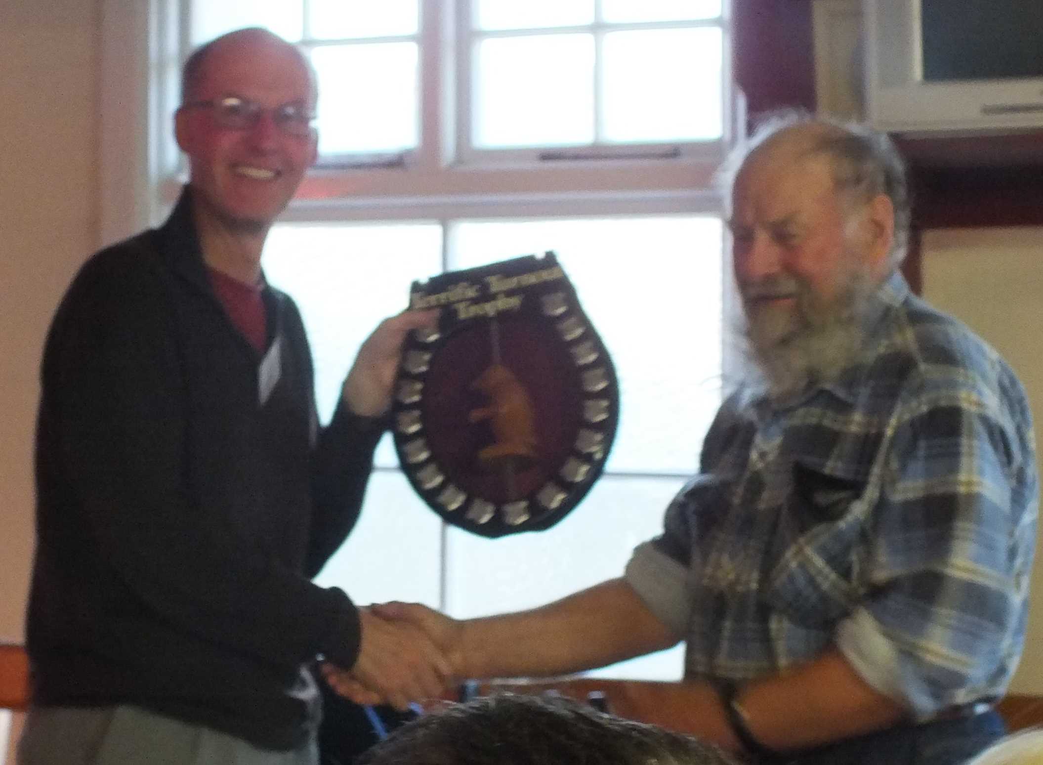 Peter Clemett accepts the trophy for the club with the best turnout